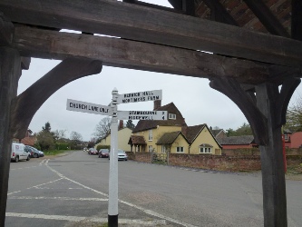 Signpost in Toppesfield Village.